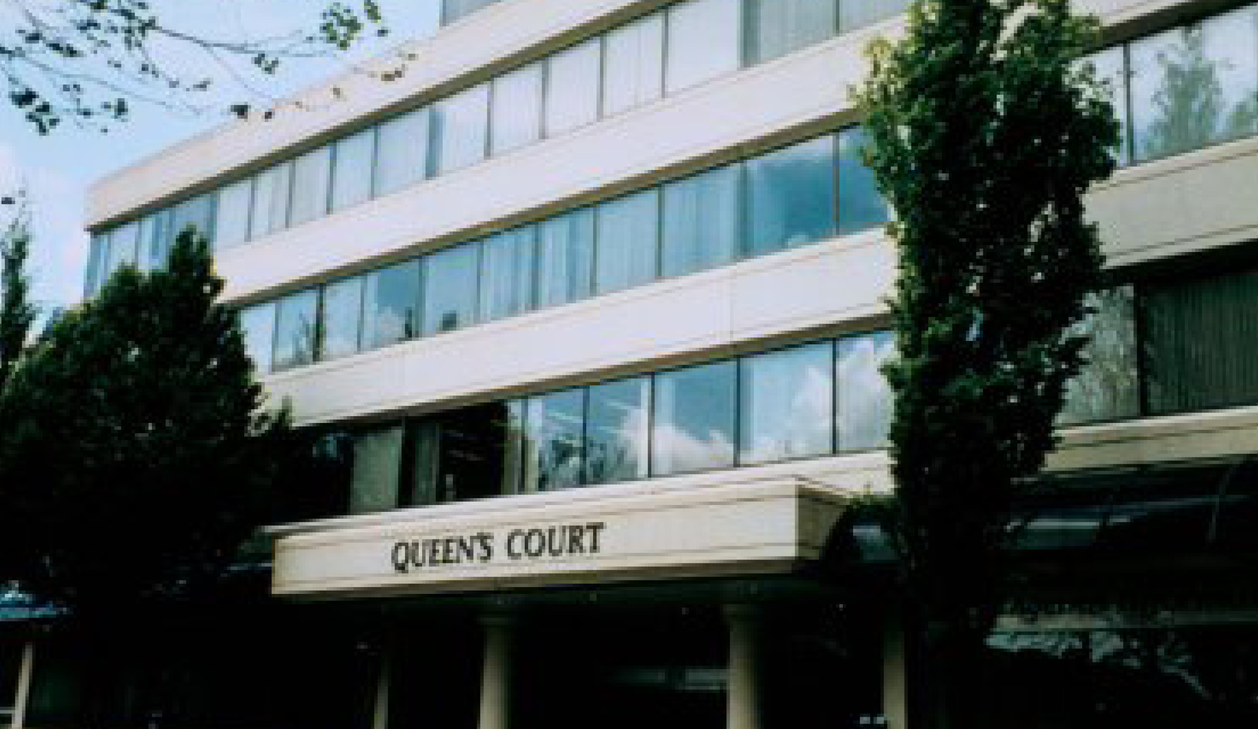 queens court exterior image thumb